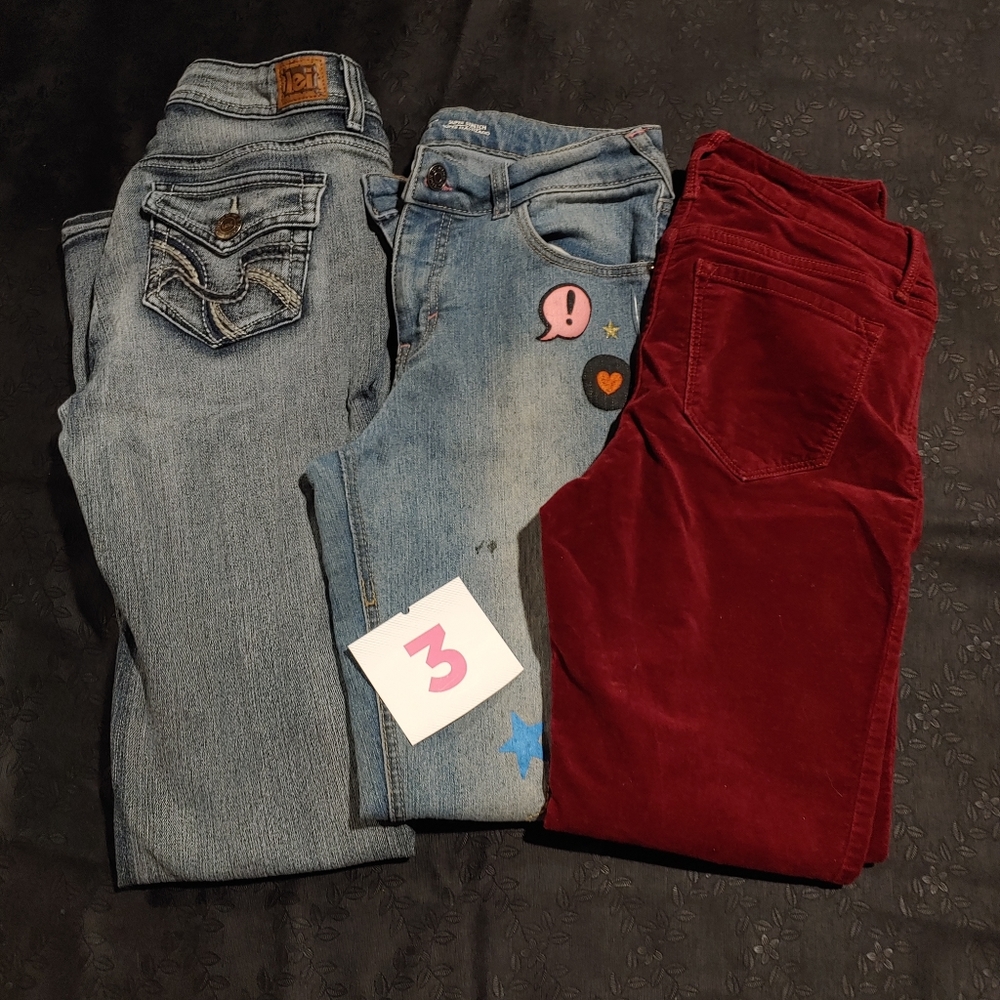 3 pairs of size 3 pants.